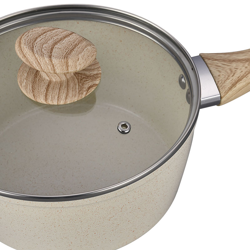 Hoques de cocción de mármol blanco cremoso y sartenes utensilios de cocina forjados