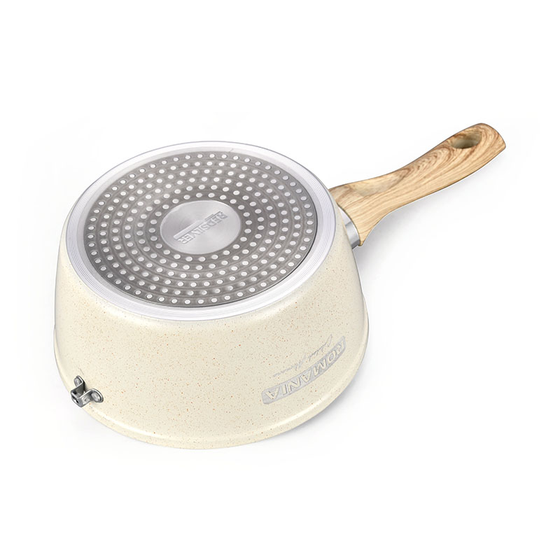Hoques de cocción de mármol blanco cremoso y sartenes utensilios de cocina forjados